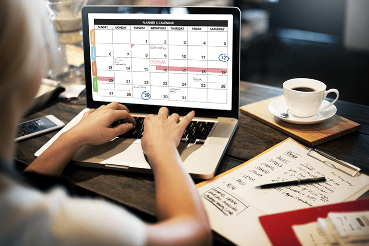 Women creating a content calendar
