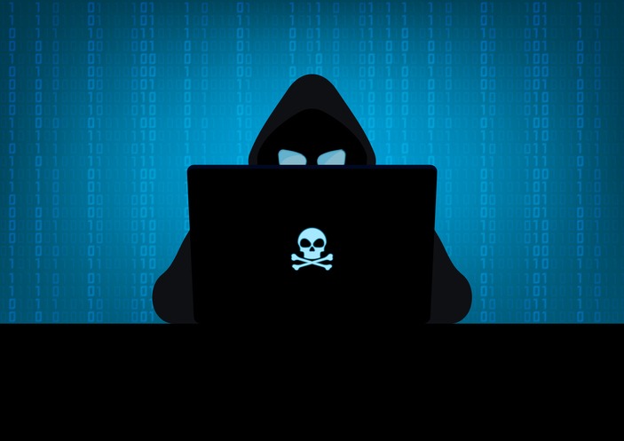 illustration of hacker in the dark