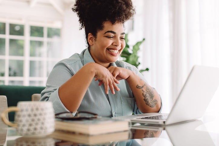 Woman engaged in online community