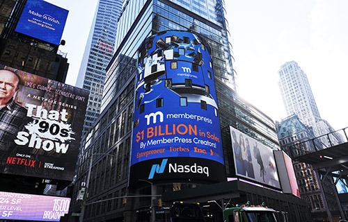 MemberPress NASDAQ billboard in Times Square, New York City.