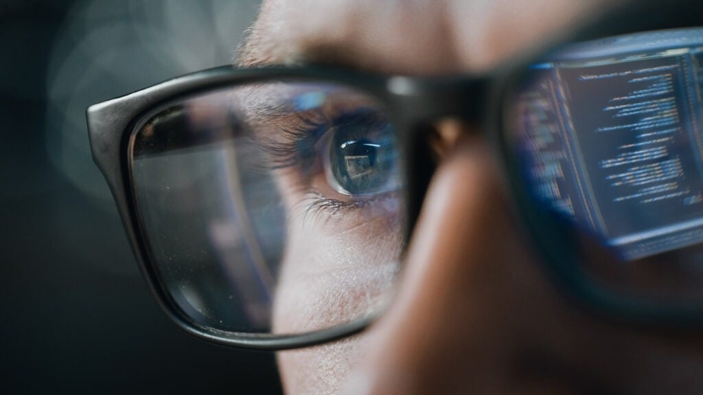 Close-up portrait of a software coder