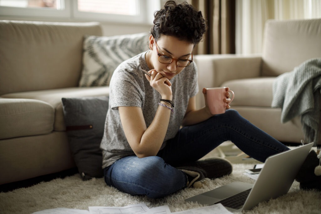 Young woman entrepreneur working at home