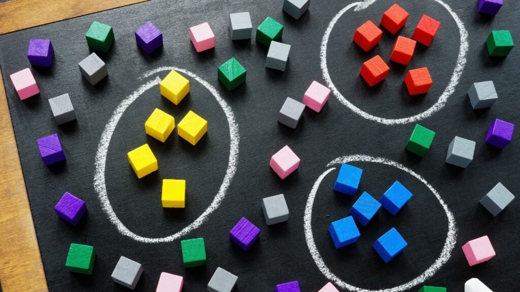 customer segmentation model concept using blocks grouped by color.
