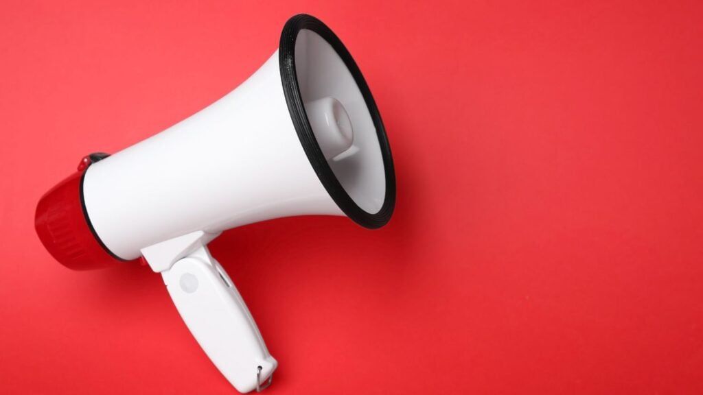 a megaphone on a red background