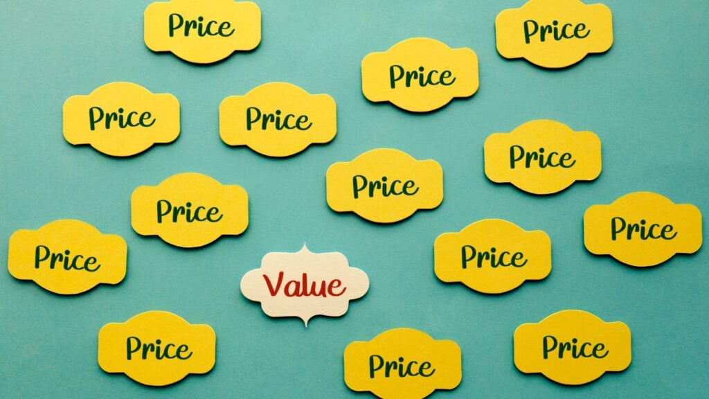 the words "value" and "price" on an adhesive note