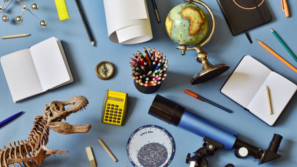 School items on a blue background