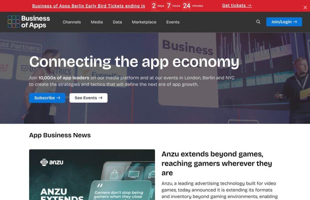Business-of-Apps | MemberPress Hero banner on Business of Apps site with the headline'Connecting the app economy' and two CTAs: blue 'Subscribe' and white 'See Events' over a dark, blurred background image of a conference.