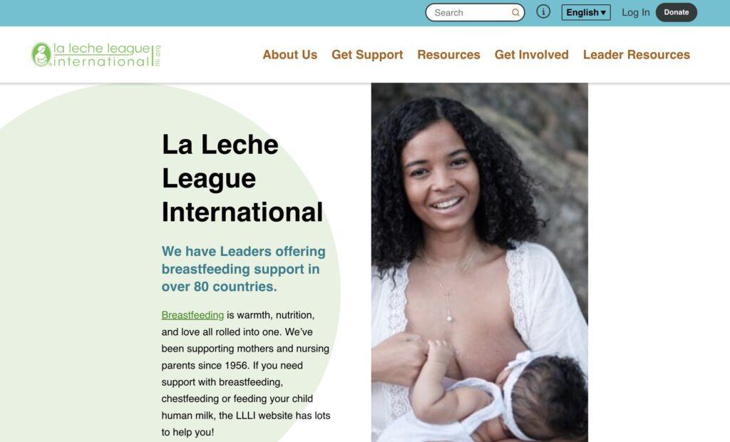 La Leche League International Homepage Screenshot | MemberPress La Leche League International branding on the left, and a smiling woman holding a baby on the right.