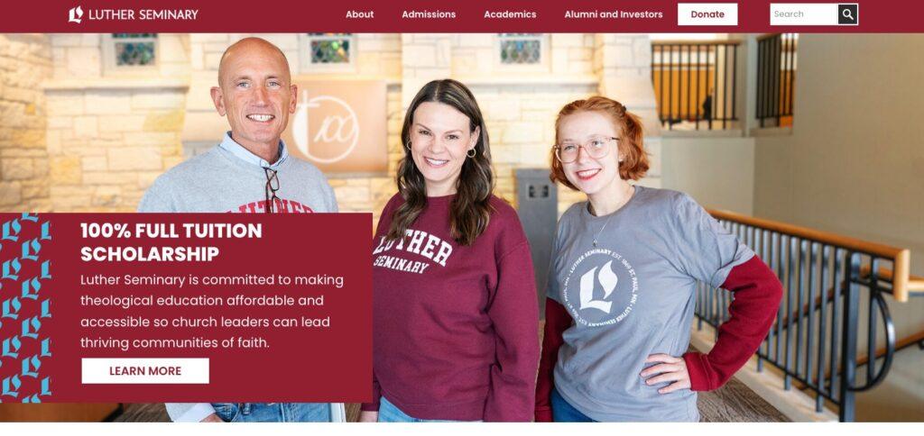 Three people stand in a campus lobby with a large maroon banner reading '100% FULL TUITION SCHOLARSHIP'