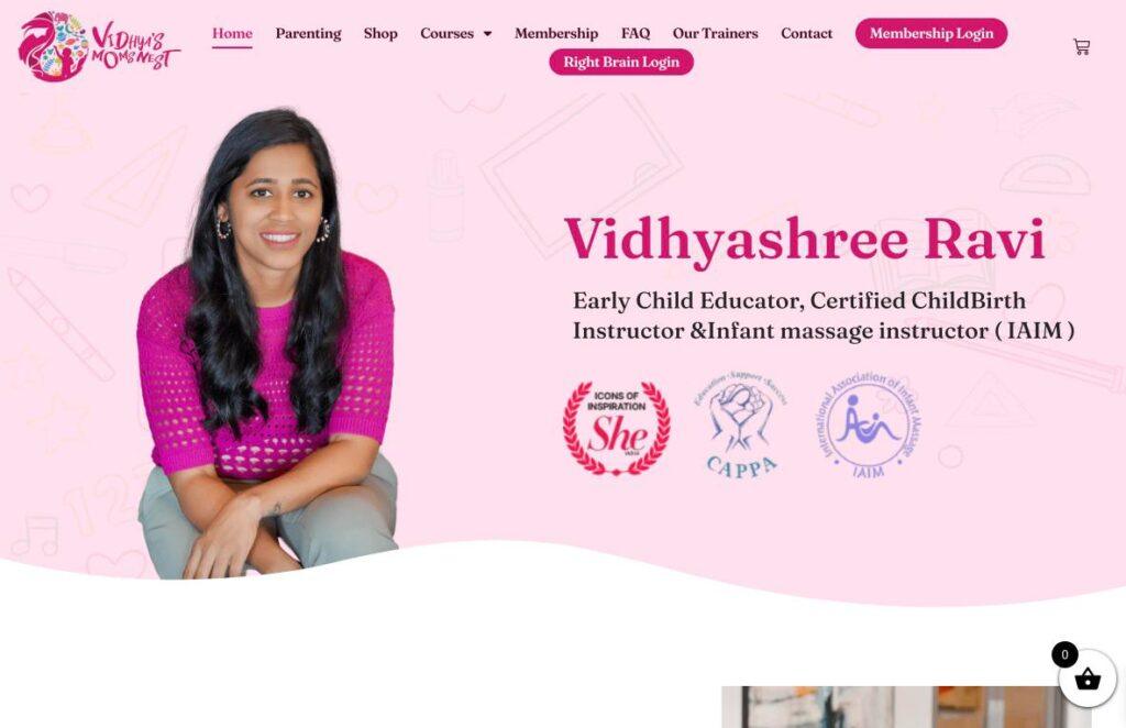 Vidhyas-MomsNest | MemberPress Portrait of Vidhyashree Ravi seated on a pink background with the Vidhya's Moms Nest branding logos nearby.